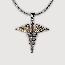  14K gold caduceus symbol pendant with intertwined serpents and wings on a chain necklace, ideal for medical professionals.