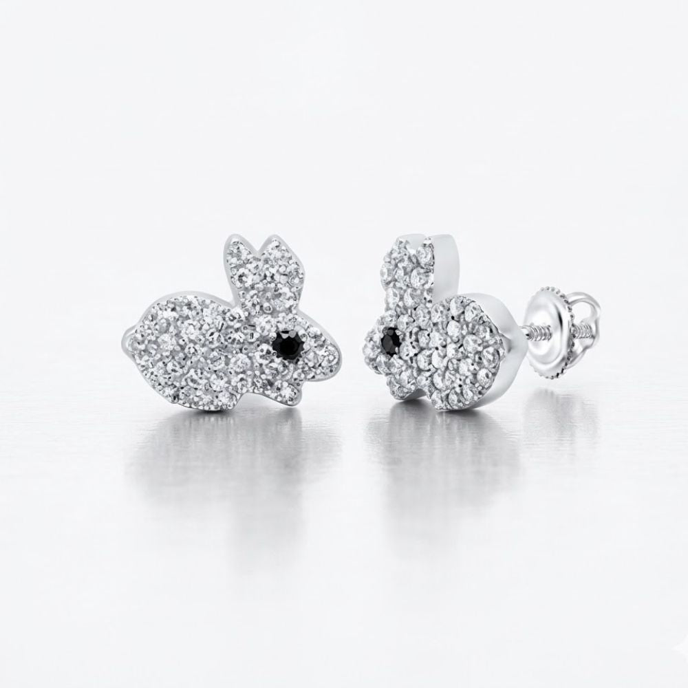 A pair of 10K Gold Black Diamond Earrings 1/4 CTW, bunny-shaped with small white gemstone accents and black diamond eyes, displayed on a plain light background.