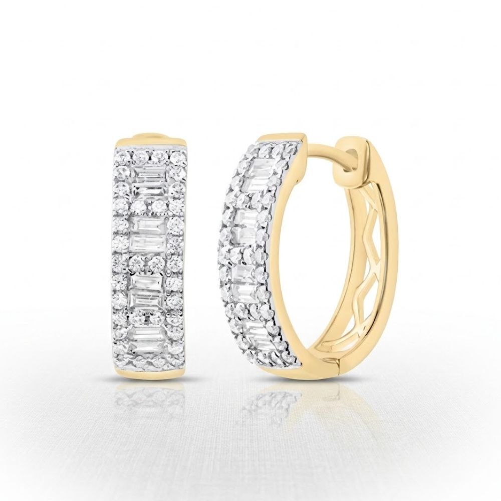 The 5/8CTW Diamond Baguette Hoop Earrings in 14K gold feature round and baguette diamonds set in three rows along the front, shown against a white background.