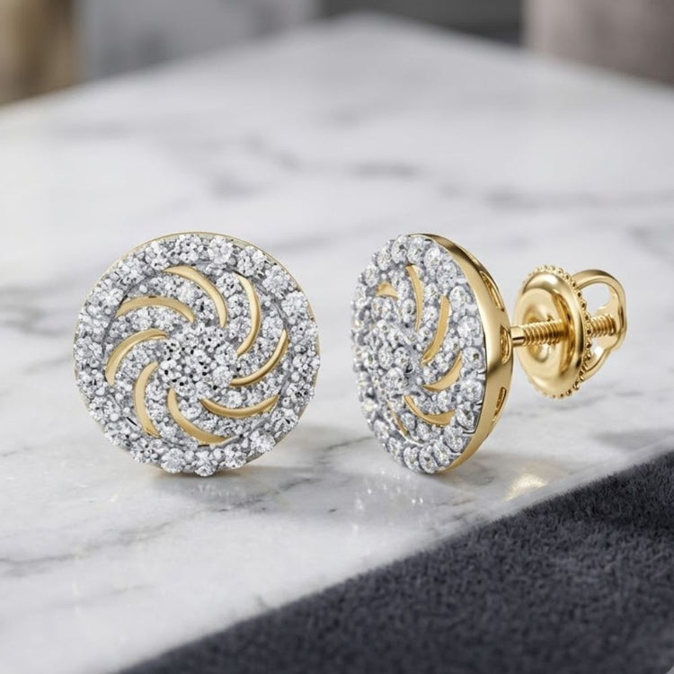 A pair of 10K gold flower stud earrings featuring a 1/3 CTW of natural diamonds is displayed on a marble surface.