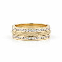 The 14k Yellow Gold Diamond Wedding Band Ring 1/2 Cttw features three textured central bands bordered by rows of round white diamonds set in parallel along the edges, shown against a white background.