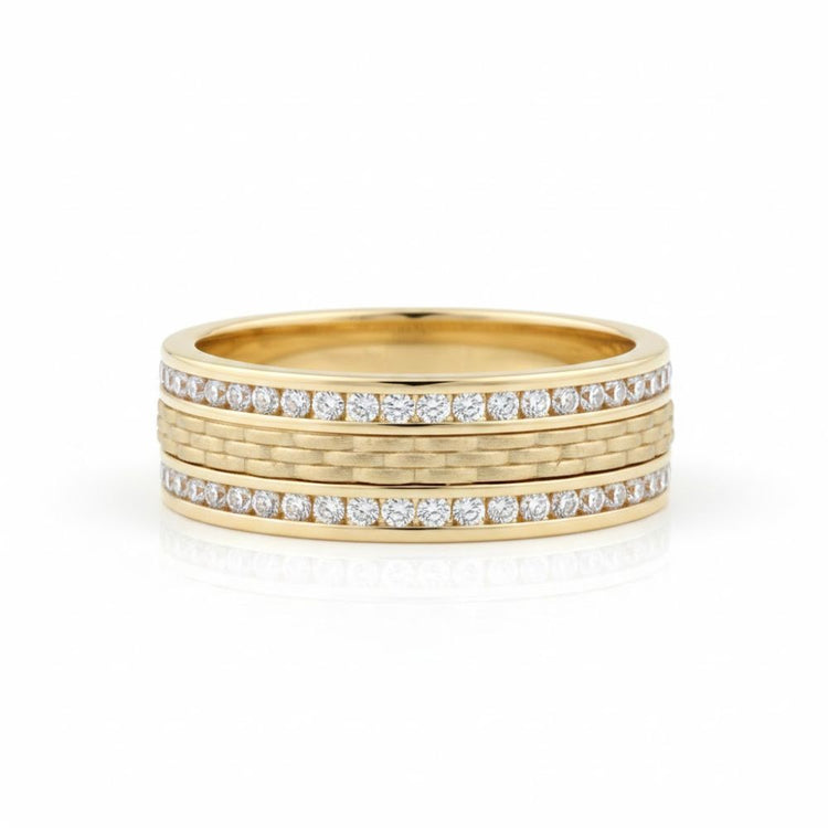 The 14k Yellow Gold Diamond Wedding Band Ring 1/2 Cttw features three textured central bands bordered by rows of round white diamonds set in parallel along the edges, shown against a white background.