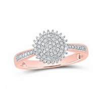 The 10k Gold Round Diamond Circle Ring 1/4 Cttw in rose gold features a central round diamond cluster and additional diamonds set along both sides of the band.