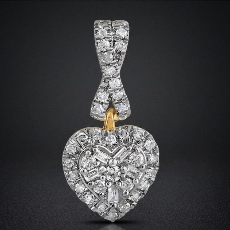 The 1/5 CTW Diamond Heart Pendant in 10K Gold features a diamond heart design with a looped diamond bail and a cluster of diamonds at the top, gleaming elegantly on a dark background—an exquisite choice for any occasion.