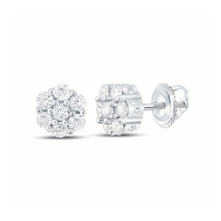 The 10k Gold Diamond Flower Cluster Earrings (1/4 Cttw) feature round, sparkling diamonds set in white gold, shown from the front and side with secure screw-back closures.