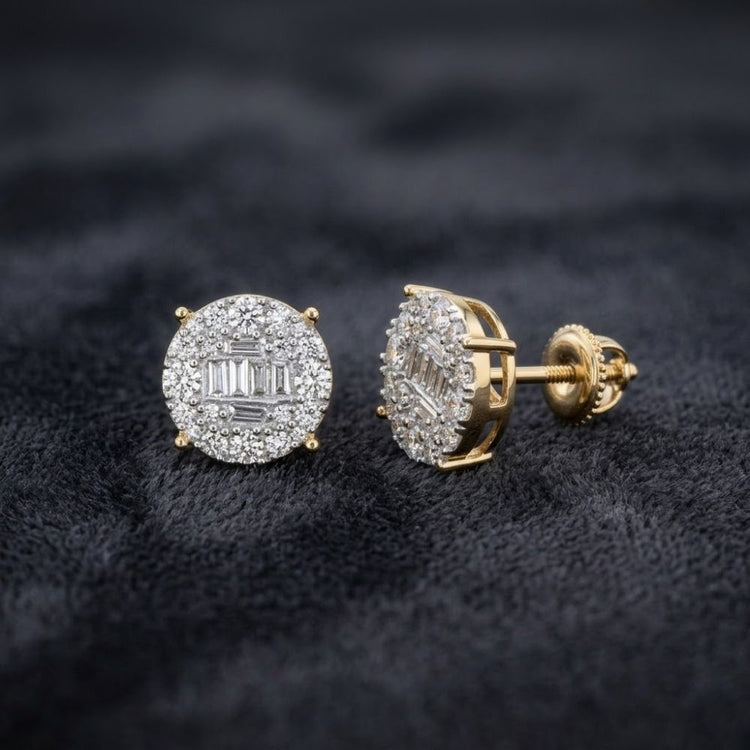 10k Gold Baguette Diamond Circle Earrings 1 CTTW featuring central baguette and round diamonds with a halo of smaller diamonds, shown on a dark textured fabric.