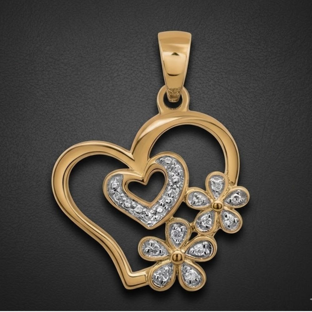 The Diamond Flower Heart Pendant 1/20 CTW 10K Gold features two overlapping hearts—one in gold, the other with sparkling diamonds—accented by two diamond-studded flowers for a romantic, eye-catching look against a black background.