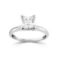The 14k White Gold Princess Diamond Bridal Ring 3/4 Cttw showcases a striking princess-cut diamond solitaire in a four-prong setting, elegantly displayed on a plain white background.