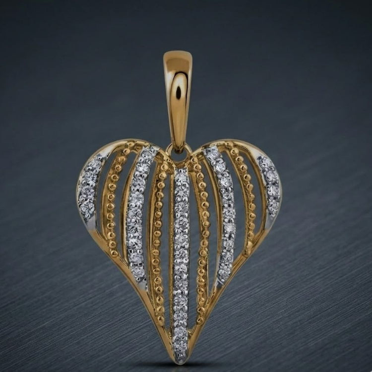 The 1/5 CTW Natural Diamond Heart Pendant in 10K gold features vertical rows of sparkling diamonds and gold beaded accents, creating a striking look against a dark, textured backdrop.
