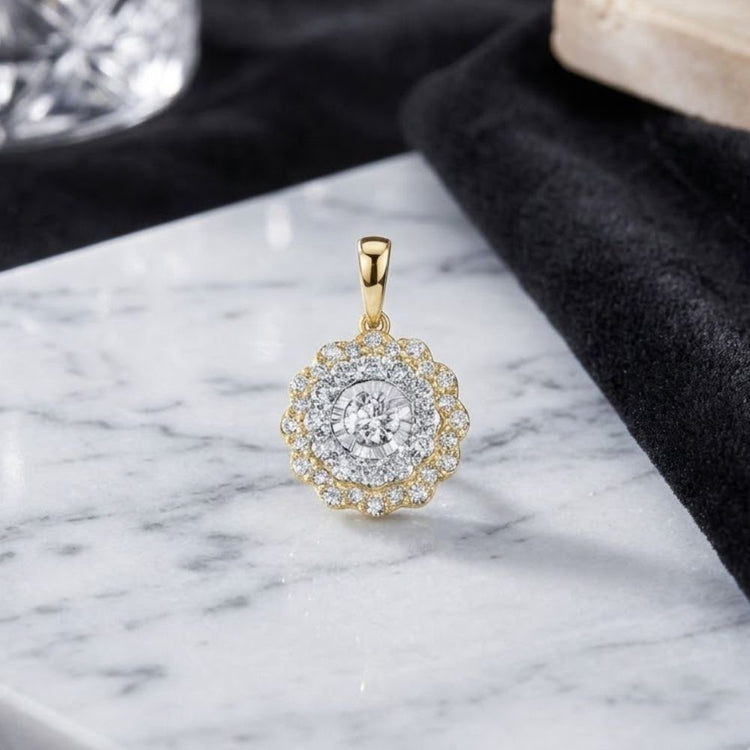 The 10k Gold Diamond Fashion Pendant 3/4 Cttw, featuring a round, flower-inspired design adorned with sparkling diamonds, is displayed on a white marble surface.
