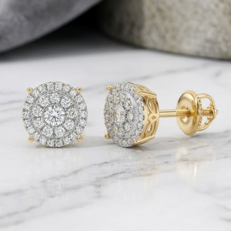 A pair of 14K Gold Round Diamond Cluster Earrings, totaling 5/8 carat weight, featuring multiple rows of sparkling round diamonds and displayed on a white marble surface.
