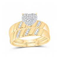 A 1/4CTW diamond heart necklace in 10k gold features a central heart-shaped diamond cluster and additional accent diamonds, all set in polished yellow gold. Marked HK inside, it pairs beautifully with matching diamond heart rings.