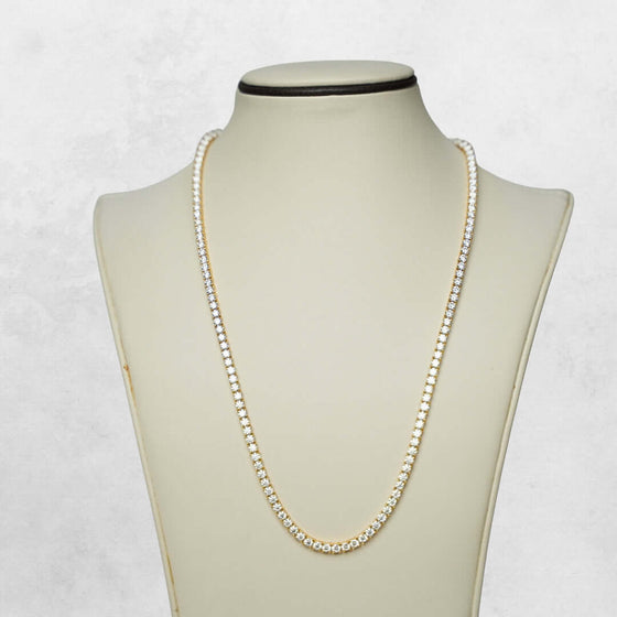 Moissanite Tennis Chain - 3MM Dazzling 3MM moissanite tennis chain in 14k yellow, white, or rose gold. Choose from 16"-22" lengths. In stock and ready to ship – order yours now!