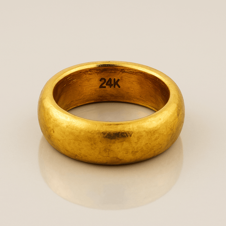 The 8mm Band Ring -24k is a comfort-fit wedding band with a number design, crafted from 24k gold.
