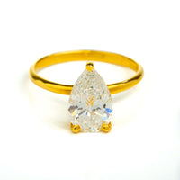 The 2.08ct Pear Lab Diamond Solitaire Engagement Ring in 14K yellow gold features a large, clear pear-shaped lab diamond in an elegant prong setting displayed against a plain white background.