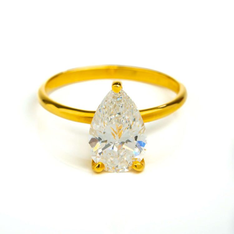The 2.08ct Pear Lab Diamond Solitaire Engagement Ring in 14K yellow gold features a large, clear pear-shaped lab diamond in an elegant prong setting displayed against a plain white background.
