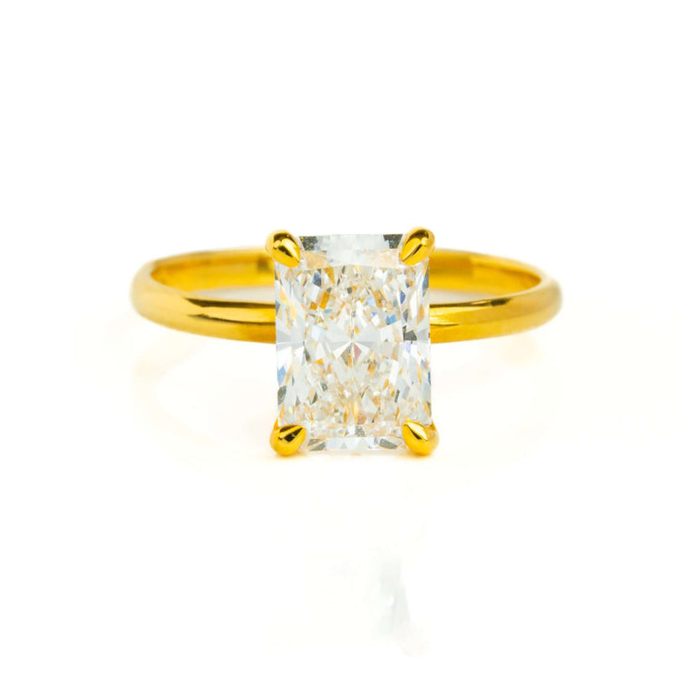 The 2.08ct Radiant Lab Diamond Solitaire Engagement Ring in 14k solid gold features a large rectangular radiant-cut diamond with four prongs, shown on a white background—ideal for those seeking elegant women’s engagement rings.