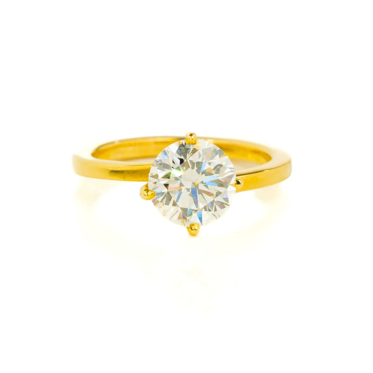 A 2.09ct round lab diamond solitaire engagement ring in 14k yellow gold with a four-prong setting, displayed on a white background.