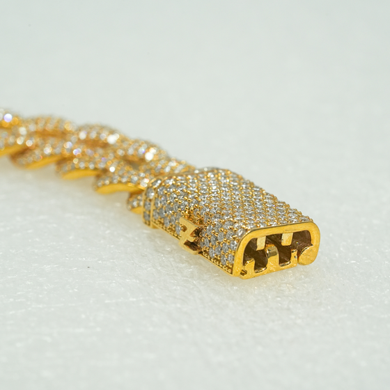 alt=" 11mm Cuban link chain in 10k gold with 21CT E-F VS lab-grown diamonds. Bold, luxurious, and sustainably crafted for modern elegance. "