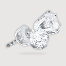  alt=" Discover 2CTW diamond solitaire earrings in 14k gold. Perfect for any occasion, these versatile studs add elegance and charm to your style. "