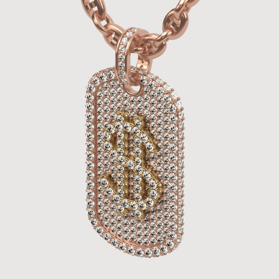 Luxurious 14K gold diamond dollar sign dog tag pendant showcasing bold design and shimmering elegance.