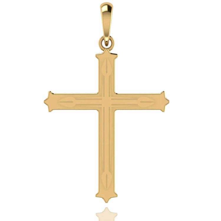 The 14k Gold Decorative Cross Pendant features a smooth, shiny finish with pointed tips, subtle engraved lines for detail, and a loop at the top for attaching to a chain.