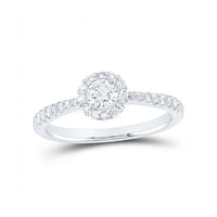 The 14k Gold Round Diamond Halo Engagement Ring features a central round diamond, a dazzling diamond halo, and additional diamonds set along the band for extra sparkle.