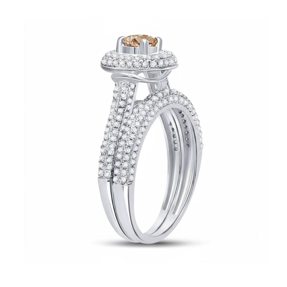 The 14k Yellow Gold Brown Diamond Bridal Engagement Ring Set features a round brown diamond center, a halo of clear diamonds, additional stones along the band, and a matching wedding band—an elegant choice for your special day.