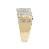 The 0.73 CTW Natural Diamond Cluster Ring in 14K yellow gold features a rectangular diamond-studded top with multiple sparkling rows and additional diamonds accenting the band’s side.
