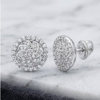 10K gold 1/3 CTW diamond flower stud earrings, featuring a delicate floral design, set in white metal and displayed on a marble surface.