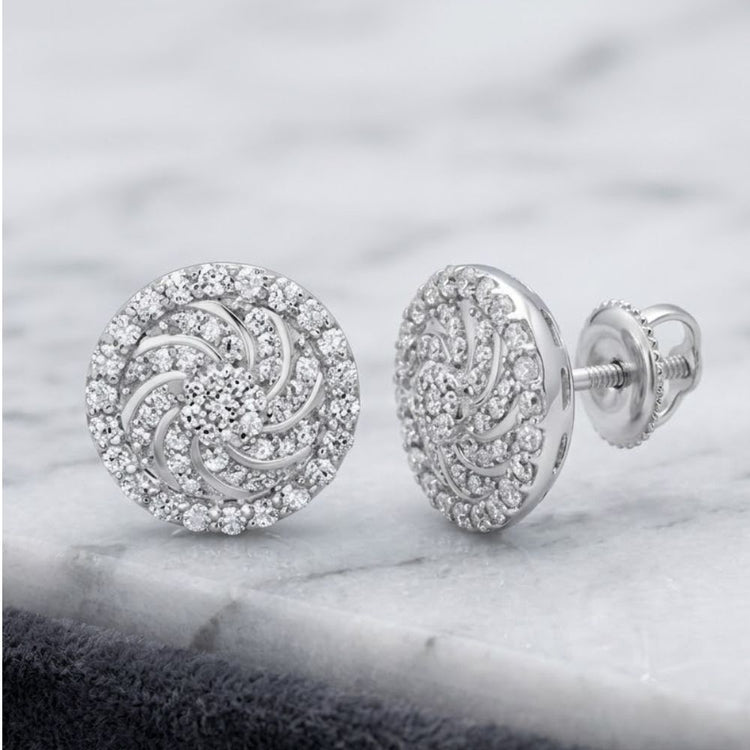 10K gold 1/3 CTW diamond flower stud earrings, featuring a delicate floral design, set in white metal and displayed on a marble surface.
