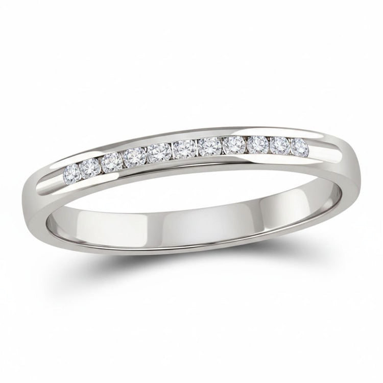The 14k White Gold Channel-Set Diamond Wedding Band 1/10 Cttw features a slim band with a single row of small, round white diamonds channel-set along the top.
