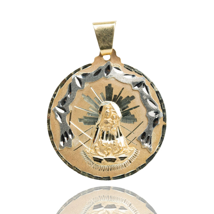 The Lady Charity Round Ornamental Pendant – 10K Solid Gold for Men features an engraved Virgin Mary at its center, accented with radiant lines and a decorative border, shown against a white background.