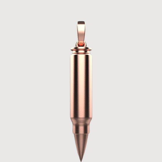 14k Gold Bullet PendantShowcase strength with the 14K Gold Bullet Pendant. Features a sleek bullet design in radiant 14K gold for a bold and modern statement piece.