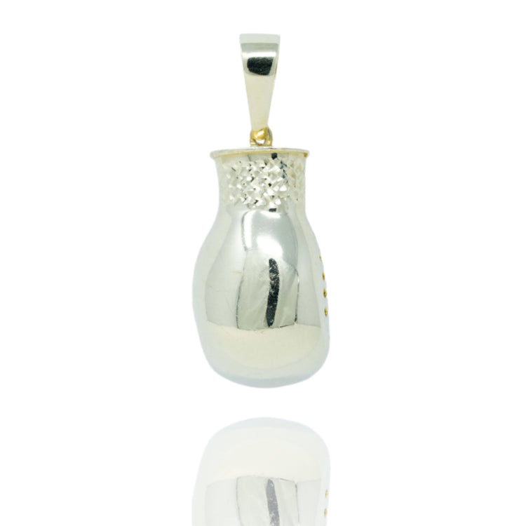 The Boxing Glove Pendant in 10k gold features a smooth, polished finish and textured details. Ideal for boxing enthusiasts seeking unique jewelry, it's beautifully displayed against a white background.
