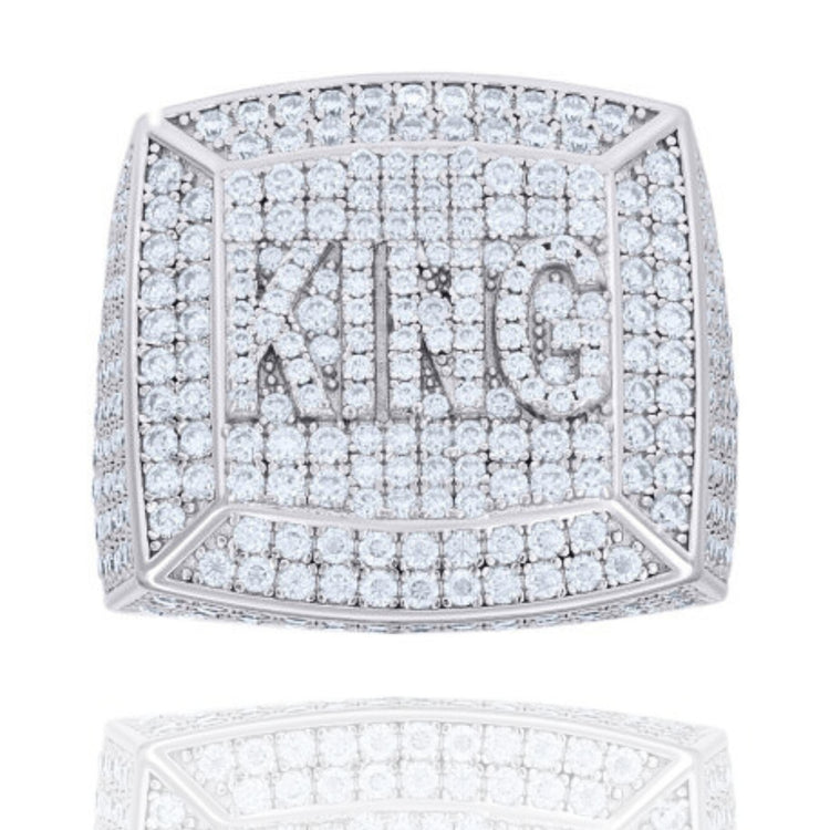 The Moissanite KING Square Head Fashion Ring features a bold square design, sparkling moissanites, and the word "KING" spelled in larger stones—ideal for those seeking standout style with KING engraving.