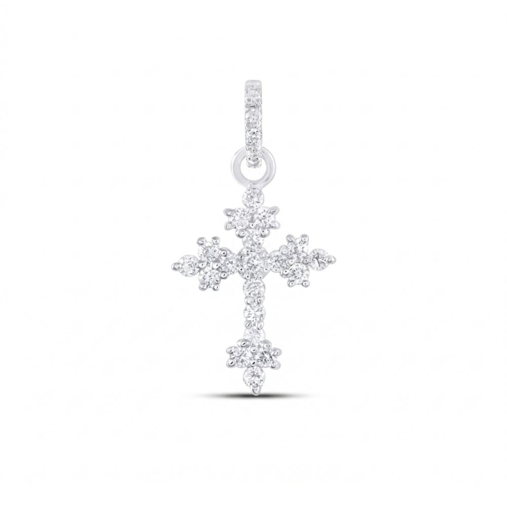 The 1/6CTW Diamond Cross Pendant in 14K yellow and white gold showcases clusters of natural diamonds and a diamond-encrusted bail, presented against a plain white background.