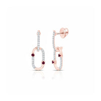 The 1/6CTW Diamond Paper Clip Earrings in 14k gold feature interlocking links adorned with white diamonds and red gemstones. Screw-back closures provide added security, offering a modern, minimalist twist on classic earrings.