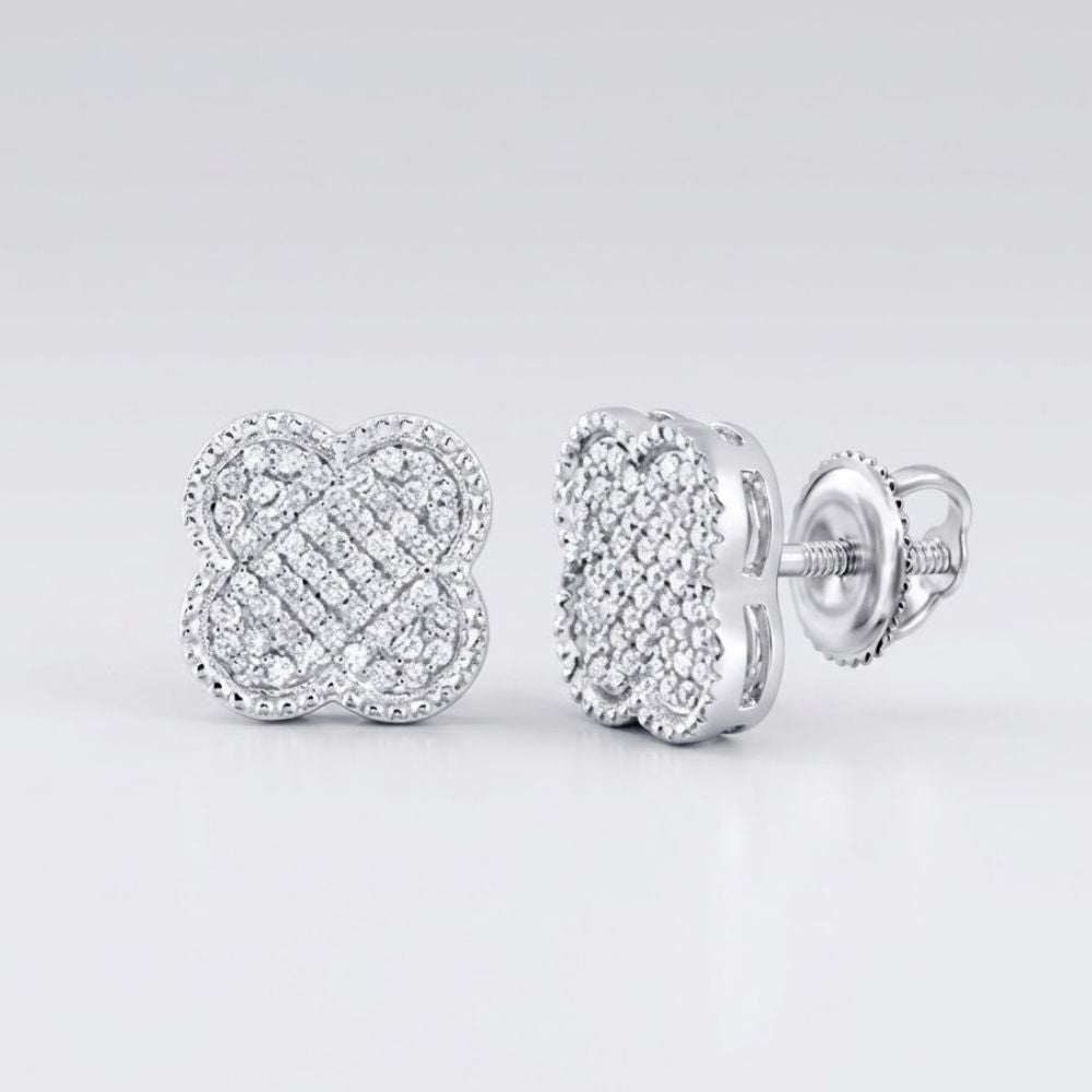 A pair of 1/5CTW Diamond Clover Earrings in 10K gold, perfect as a gift, displayed on a white surface.