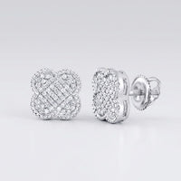 A pair of 1/5CTW Diamond Clover Earrings in 10K gold, perfect as a gift, displayed on a white surface.