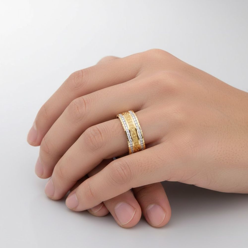 A close-up of a hand wearing the 14k Yellow Gold Diamond Wedding Band Ring 1/2 Cttw, stacked with another gold band, shown against a plain, light-colored background.