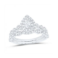 The 10k Gold Pear Diamond Halo Bridal Ring Set 3/8 Cttw features a pear diamond with a matching twisted band, both accented with sparkling diamonds for a stunning white gold wedding ring set.