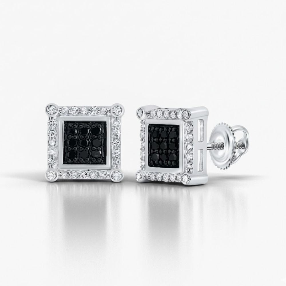 The 10K Gold Black Diamond Square Earrings 1/4 CTTW showcase black center diamonds bordered by small clear stones, set in gold with secure screw-back posts for a striking and elegant jewelry piece.