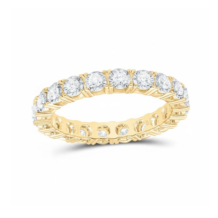 The 5/8CTW Natural Diamond Ana M Eternity Band in 14k gold showcases round, prong-set natural diamonds in a continuous yellow gold band—an elegant choice for a wedding ring, shown on a sleek white background.