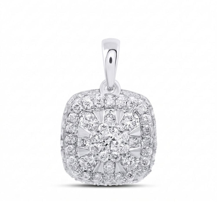 The 14K Gold 1/2 Ctw Diamond Cushion Pendant features a cluster of round diamonds at its center, framed by a double halo of sparkling stones and set in polished 14K gold for timeless elegance.