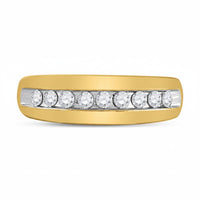 The 10k Gold Round Diamond Wedding Band 1/2 Cttw features seven round diamonds in a horizontal channel setting, displayed on a white background.