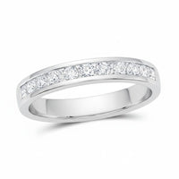 The 14k Gold Round Diamond Single Row Wedding Band 1/2 Cttw showcases seven sparkling round diamonds set in a sleek gold band, elegantly displayed on a white background.