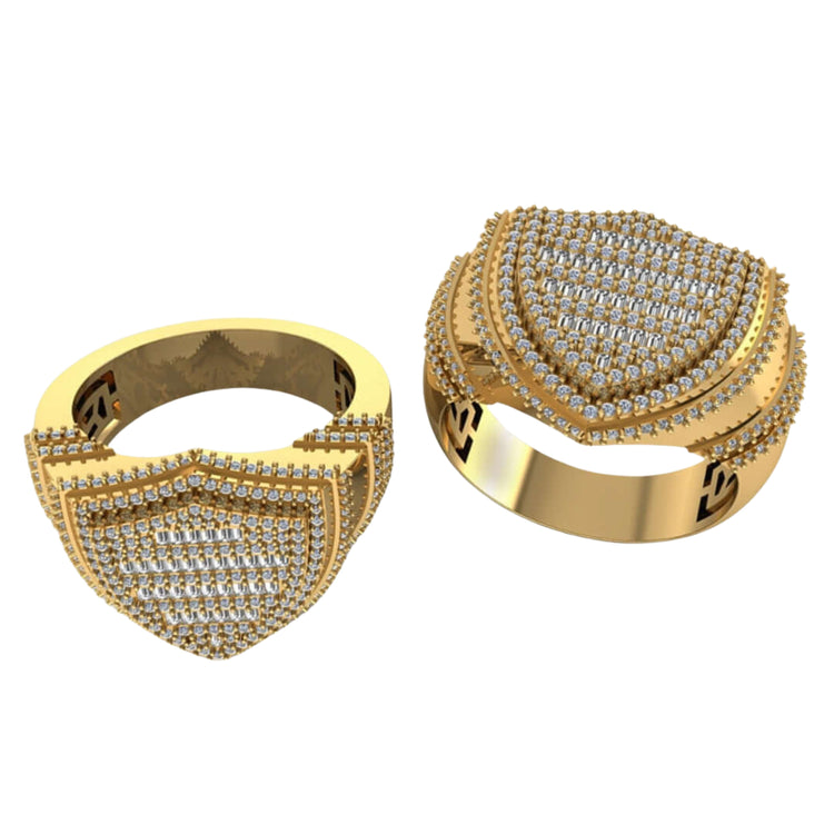 The Shield Diamond Ring – 1.13 CT Baguette Design features a bold gold shield-shaped face set with rows of sparkling diamonds, creating a striking men's ring perfect for standout style. Displayed here against a white background.