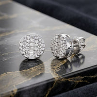 10k Gold Round Diamond Stud Earrings 1/4 Cttw—featuring geometric patterns and set in rich white metal—are elegantly displayed on a black marble surface with gold veining, offering a perfect blend of timeless style and modern sophistication.