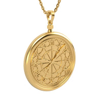 The 14k Gold Pocket Watch Pendant showcases a decorative Roman numeral face with intricate patterns, suspended from a matching gold chain for timeless vintage style.